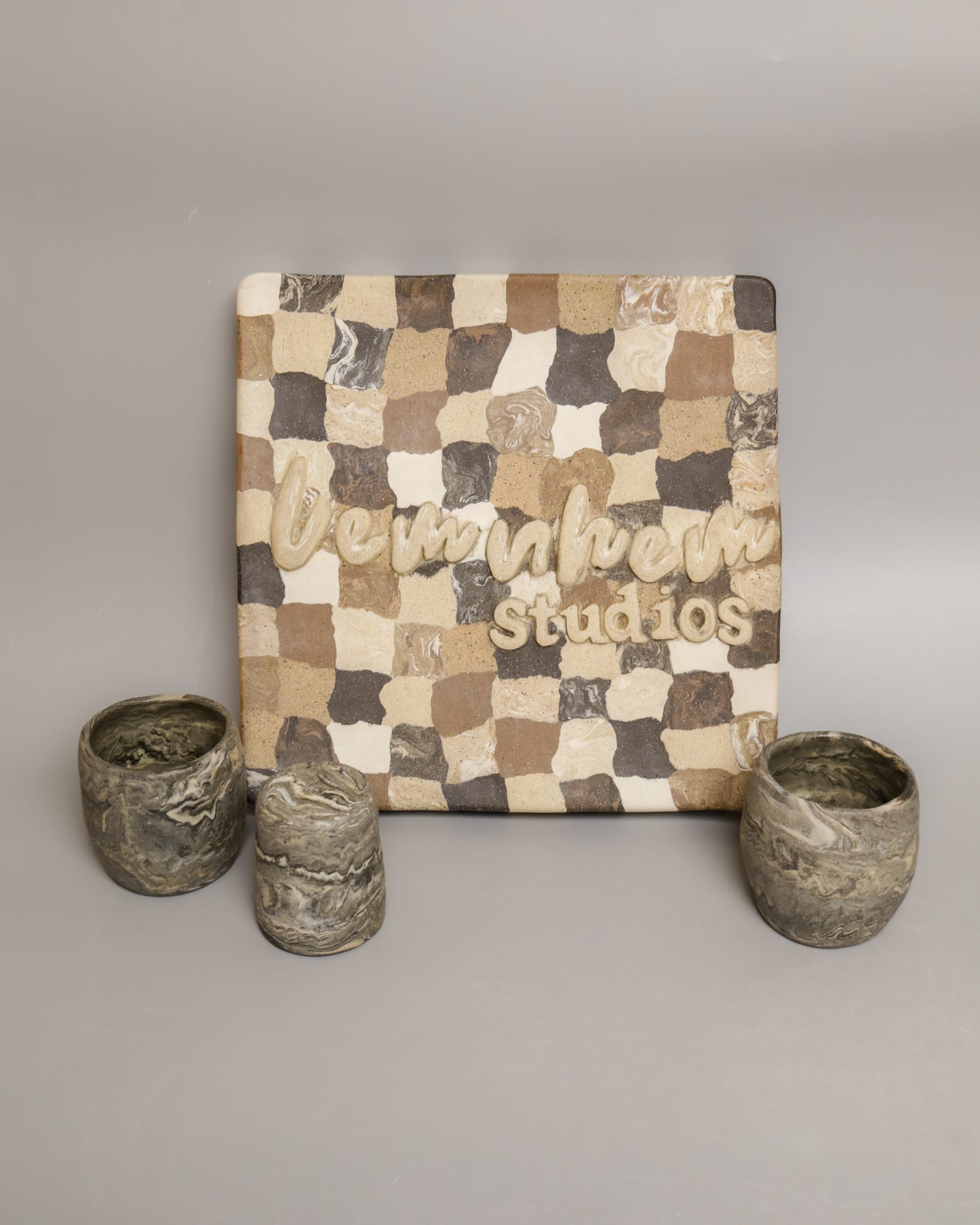 handbuilt marbled black-light buff-white cups