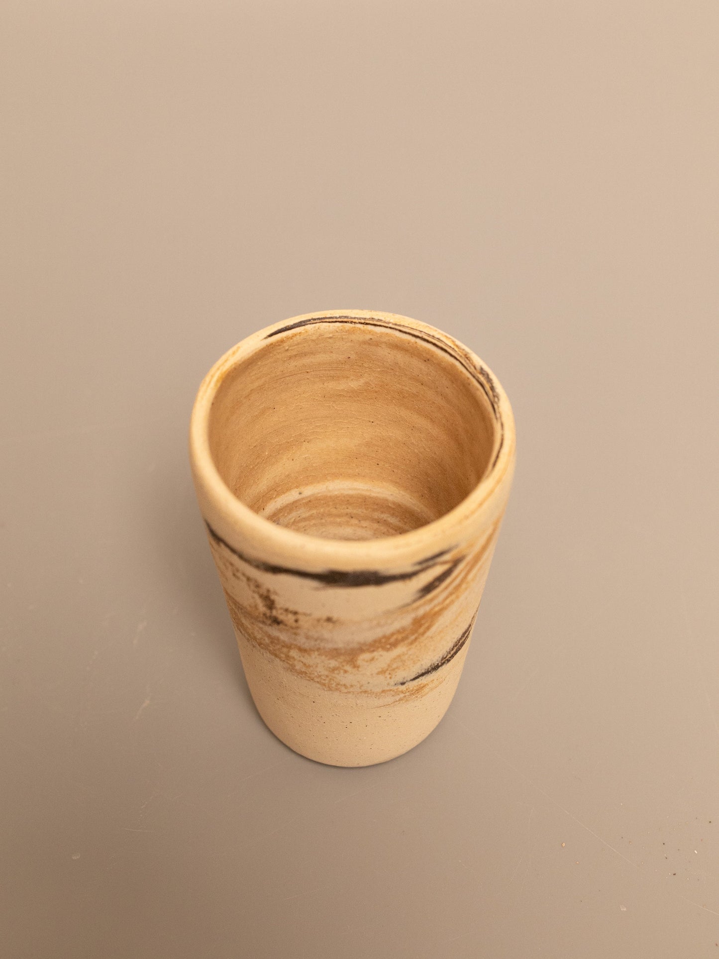 Tall marbled clay cup 1