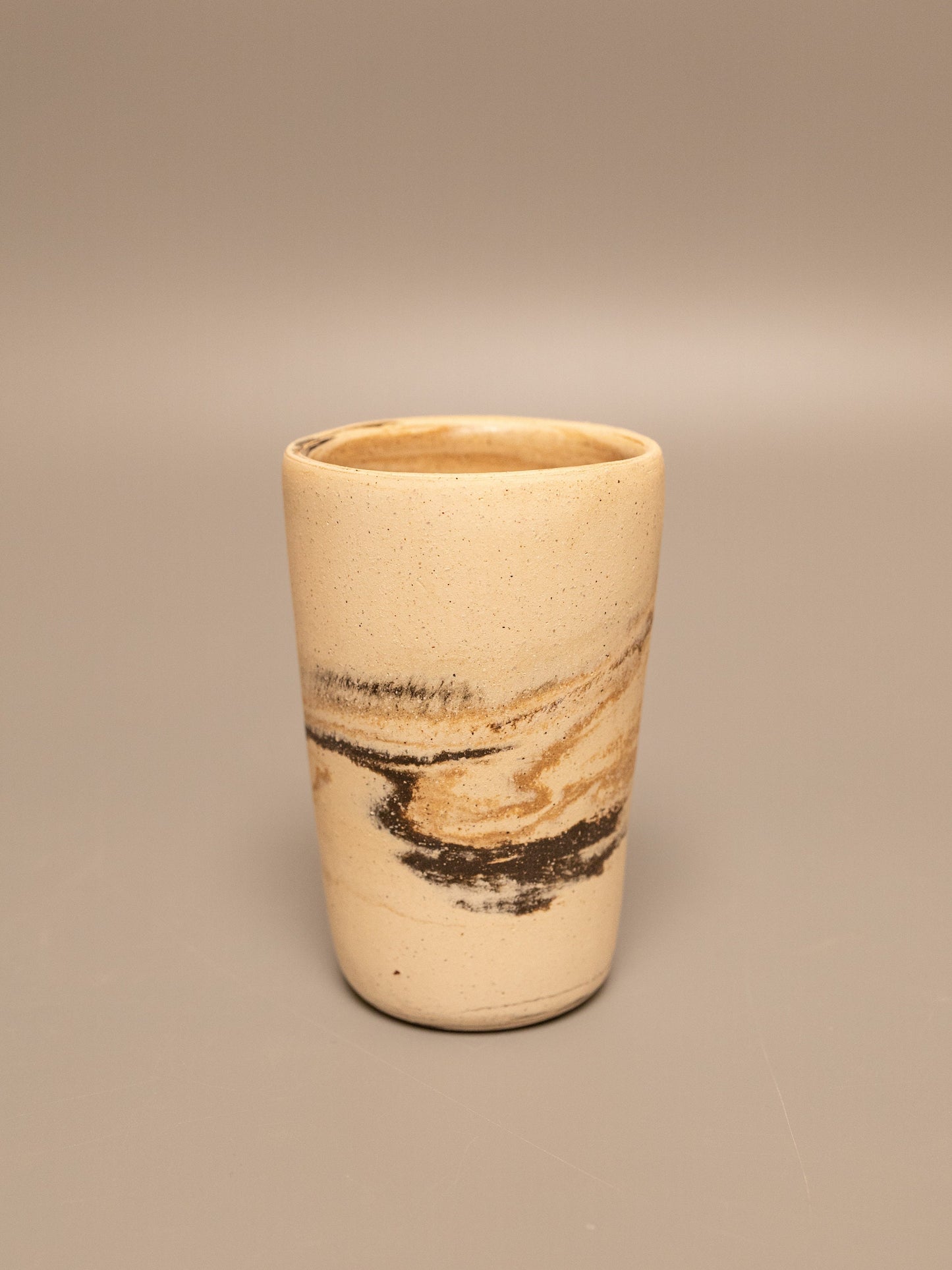 Tall marbled clay cup 1
