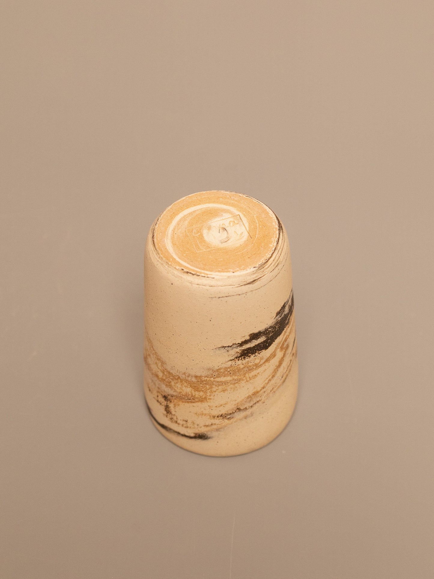 Tall marbled clay cup 1